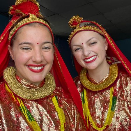 Season Homestay's guest is wearing a traditional Nepali dress.